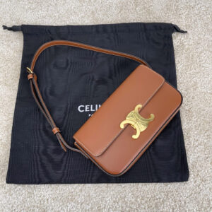 TRIOME Glossy Leather Shoulder Bag in Yellow-Brown with Hand-Rubbed Texture