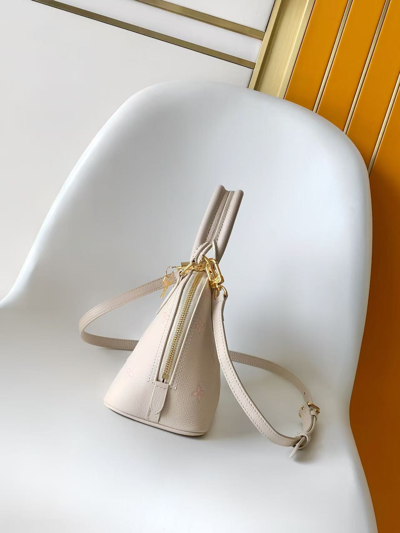 Alma BB Handbag in Monogram Empreinte Leather