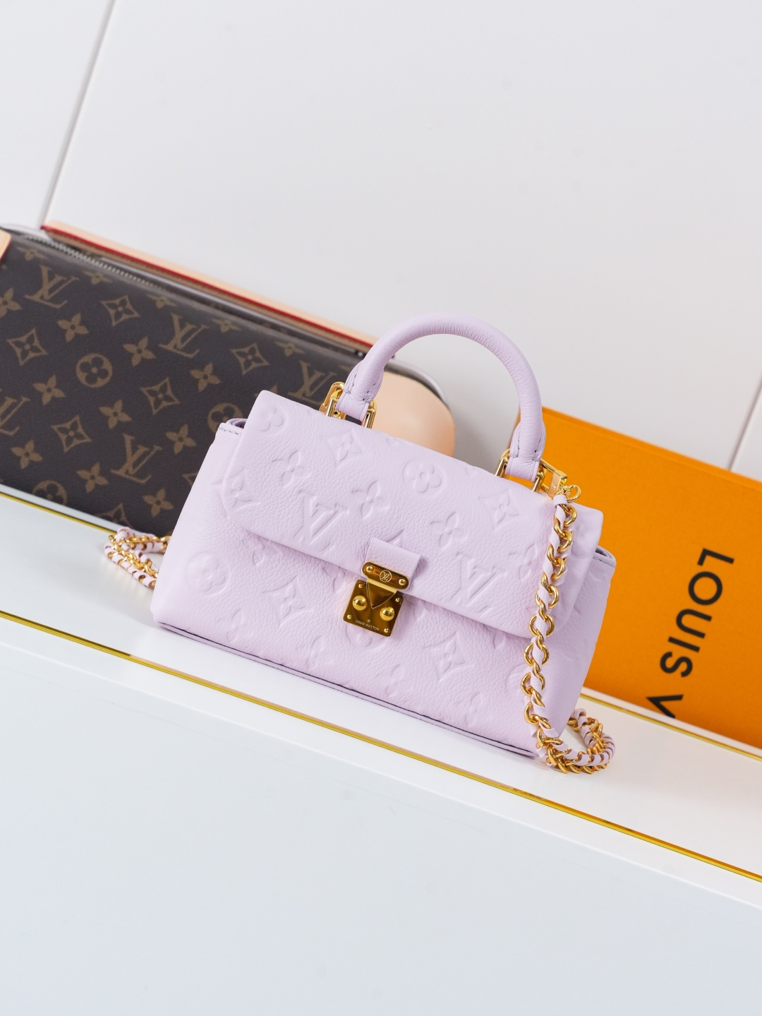 Louis Vuitton Nano Madeleine Handbag in Monogram Empreinte Leather