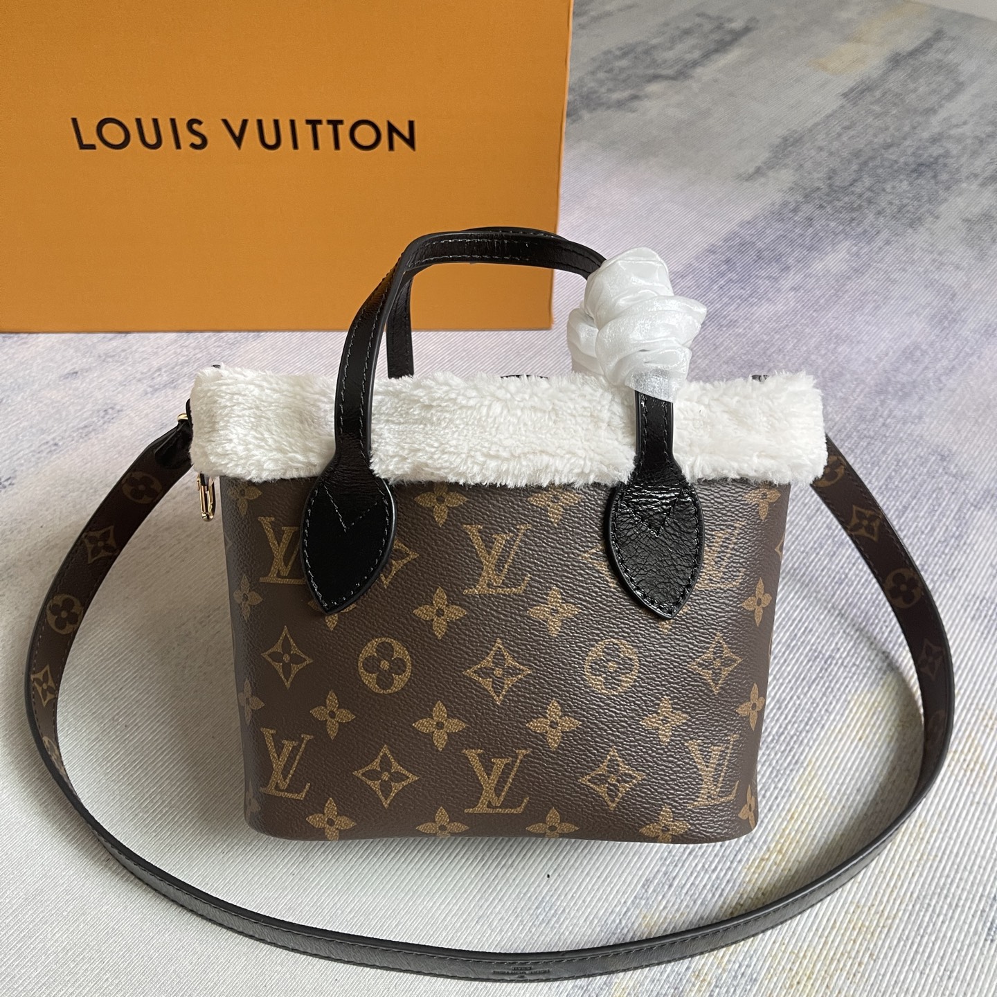 Neverfull Bandouliere Inside Out BB Handbag in Monogram Canvas and Shearling