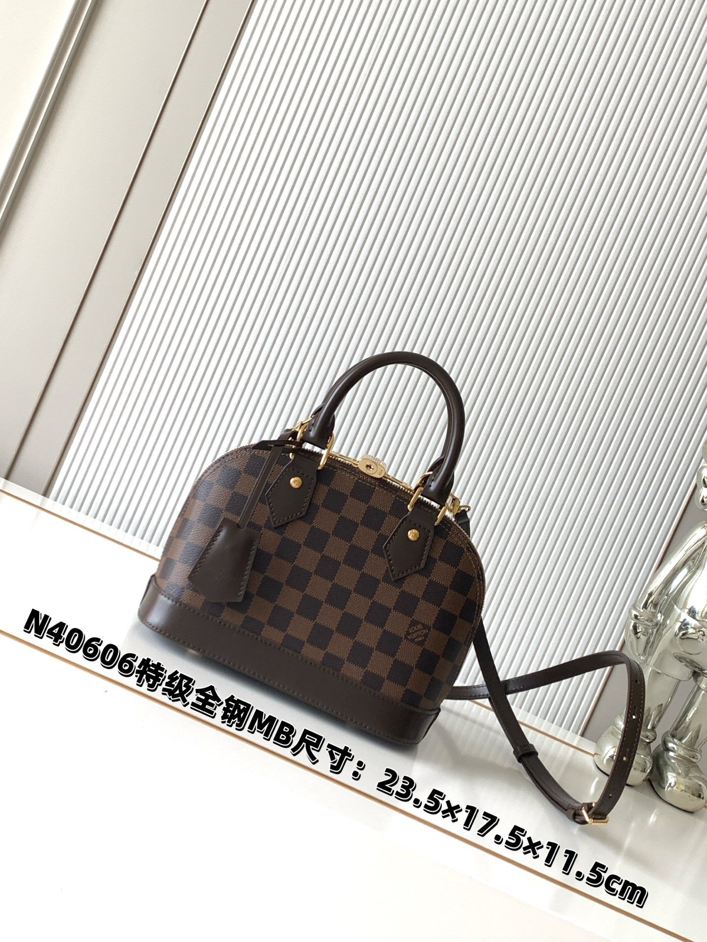 Alma BB Handbag in Damier Ebene Canvas