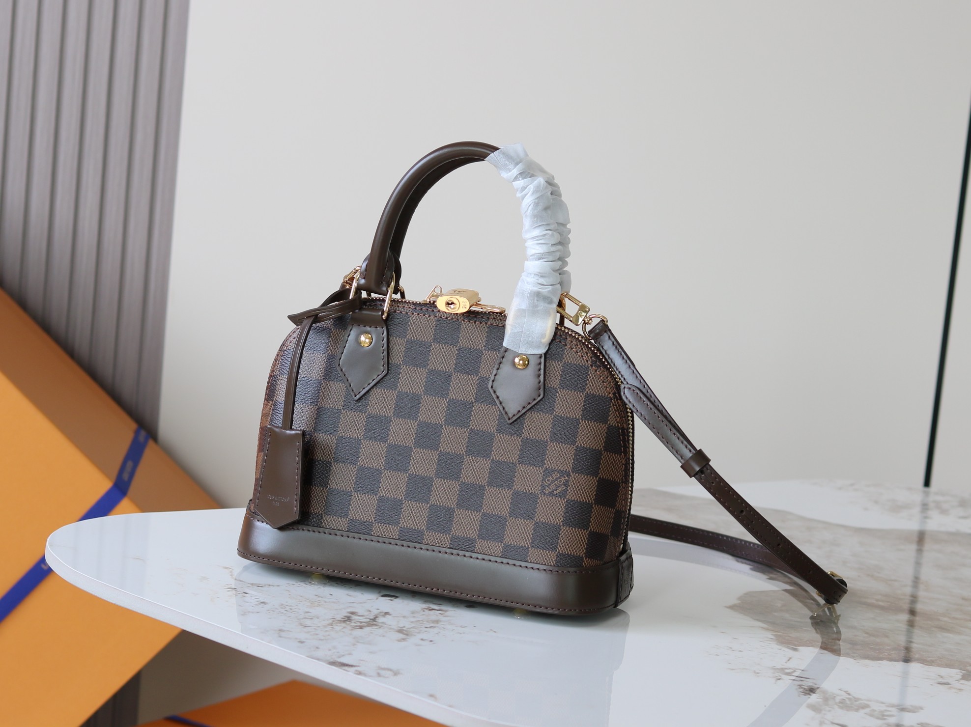 Alma BB Handbag in Damier Ebene Canvas