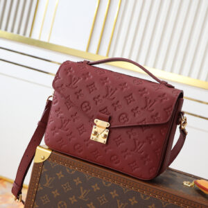 Louis Vuitton Pochette Métis Handbag in Burgundy Monogram Empreinte Leather