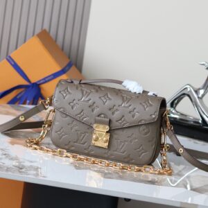 Louis Vuitton Pochette Métis East West Handbag in Smoke Monogram Empreinte Leather