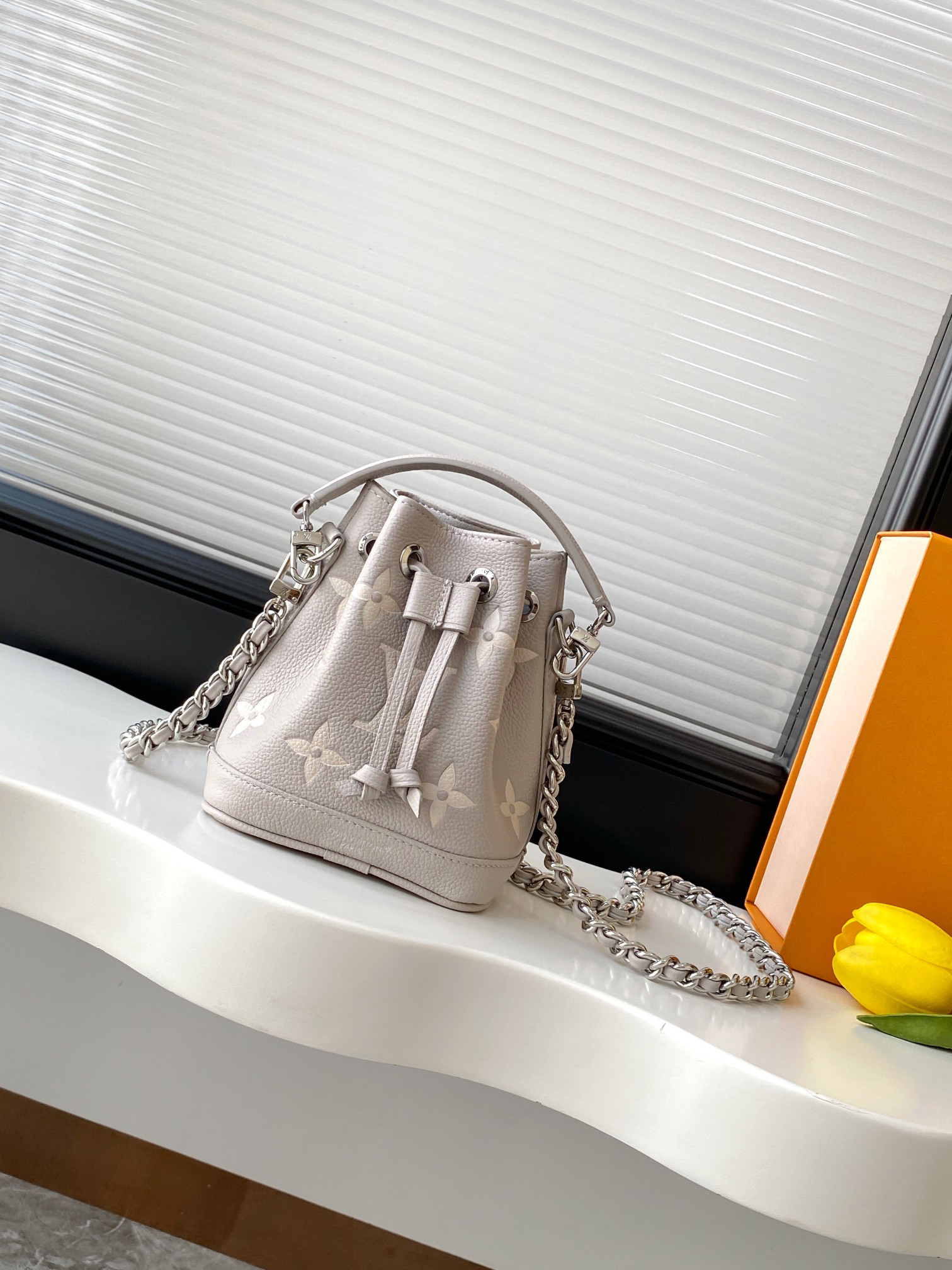 Louis Vuitton Nano Noé Monogram Empreinte Leather Crossbody Bag
