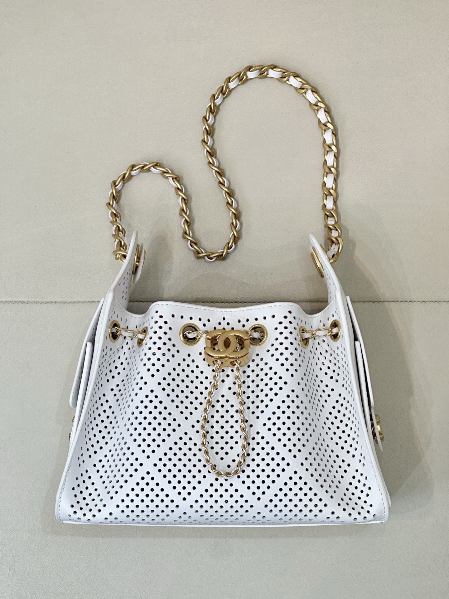 Chanel 25 Laser-Cut Drawstring Bucket Handbag