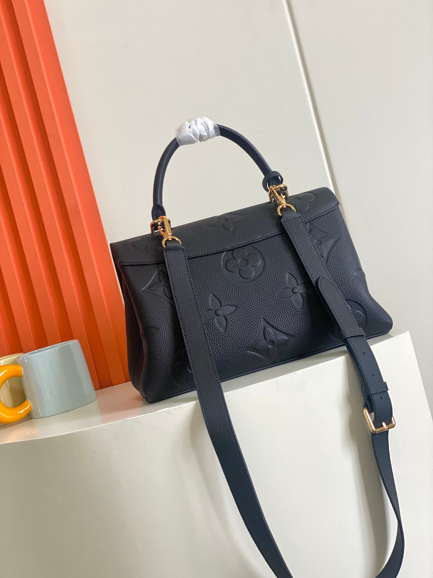 Louis Vuitton Madeleine Medium Handbag in Monogram Empreinte Leather - Image 2