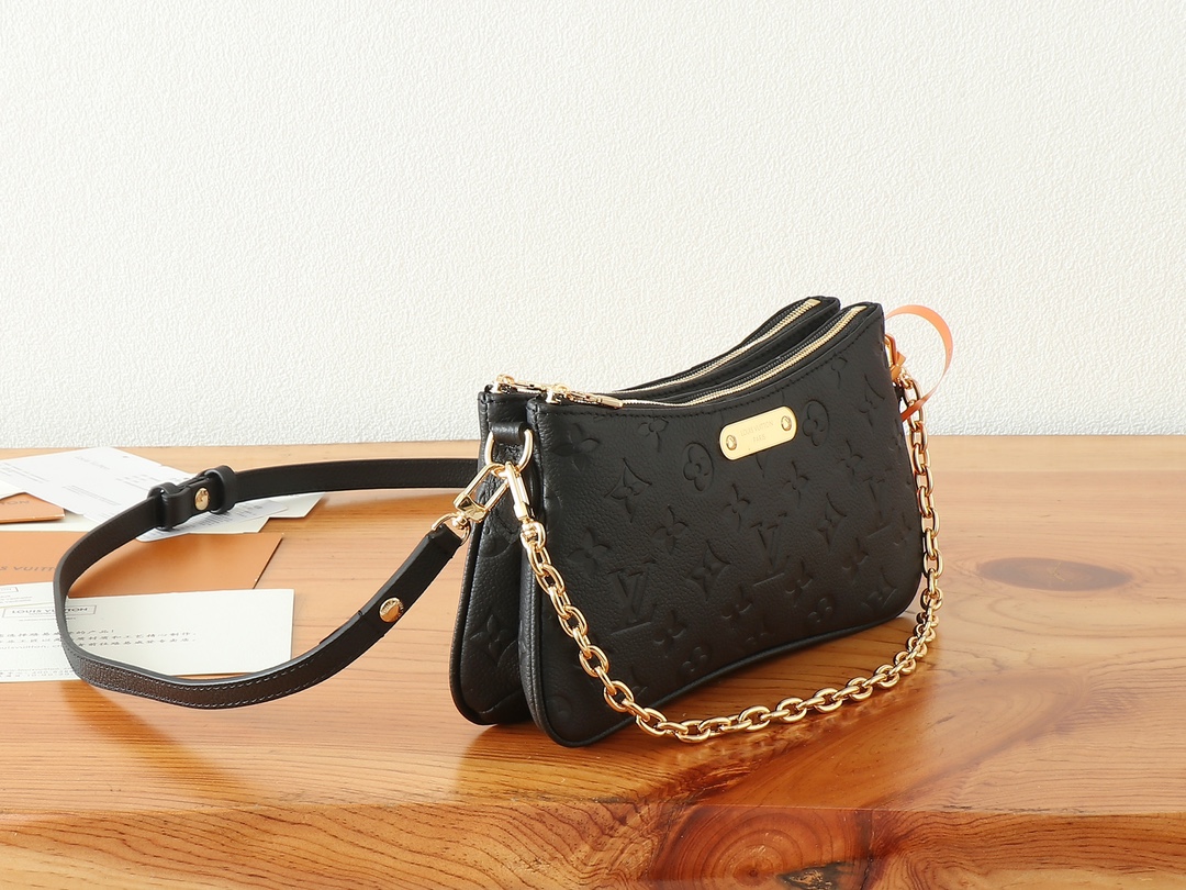 Louis Vuitton Liv Pochette Monogram Empreinte Leather Bag - Image 2