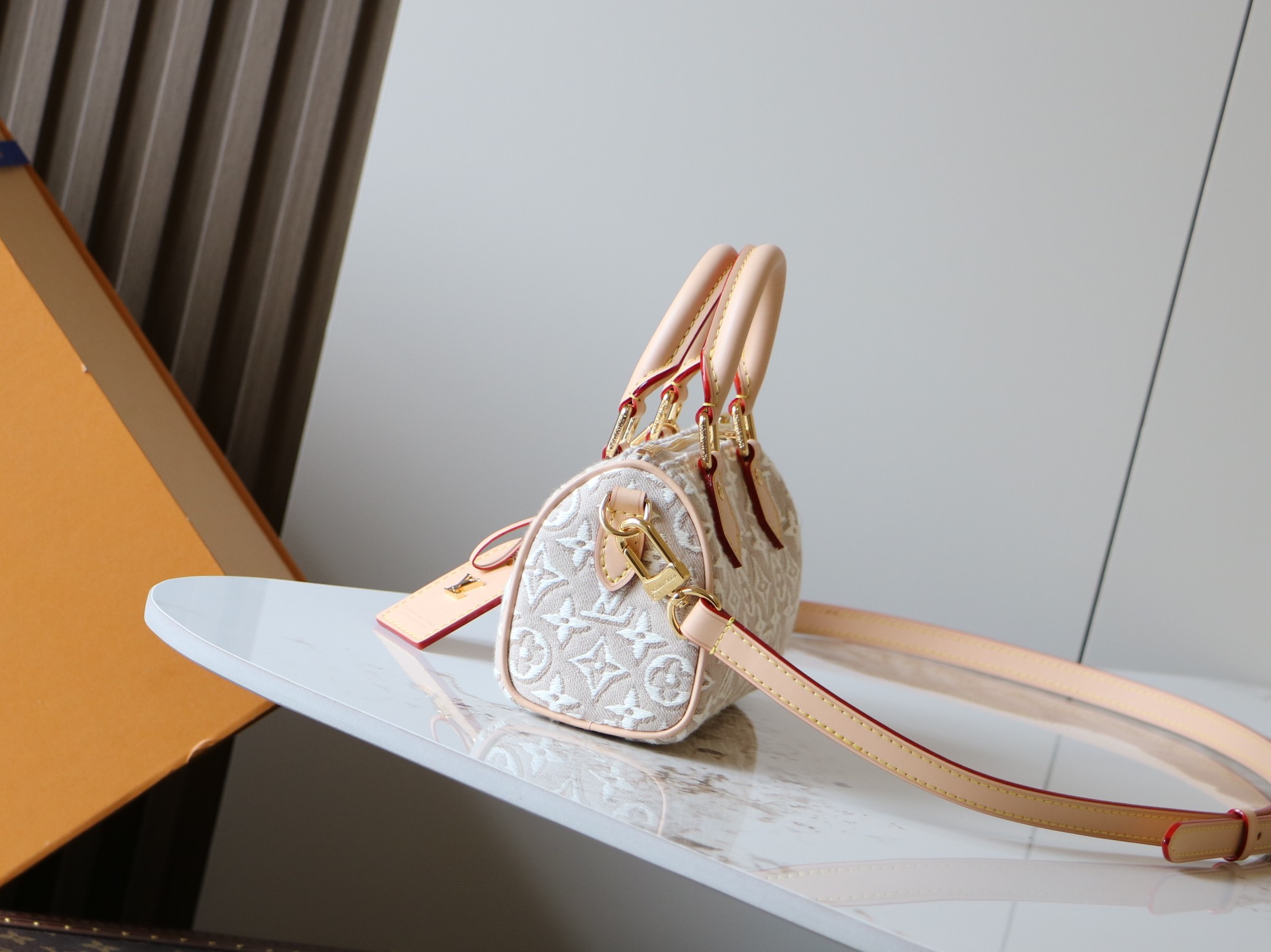 Louis Vuitton Nano Speedy Handbag in White Embossed Canvas - Image 2