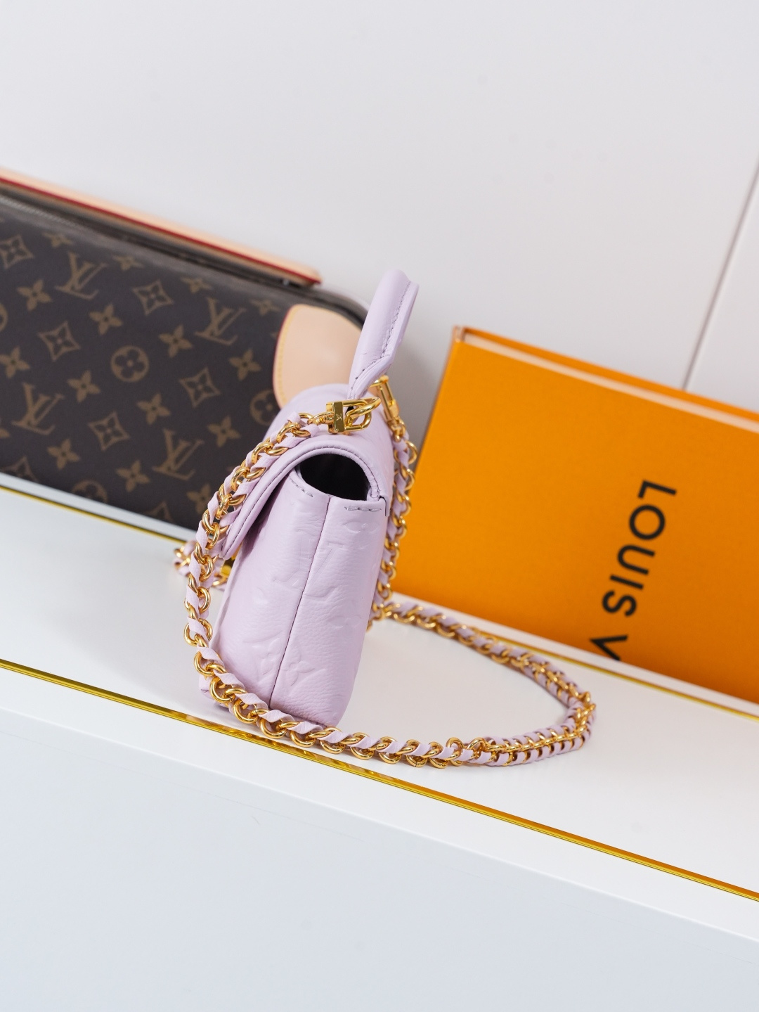 Louis Vuitton Nano Madeleine Handbag in Monogram Empreinte Leather - Image 2
