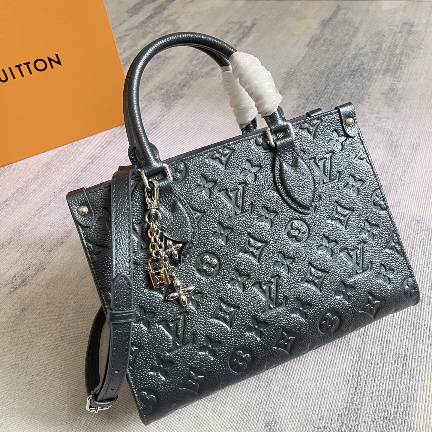 Louis Vuitton OnTheGo Tote Bag in Pearlescent Blue Embossed Leather - Image 2