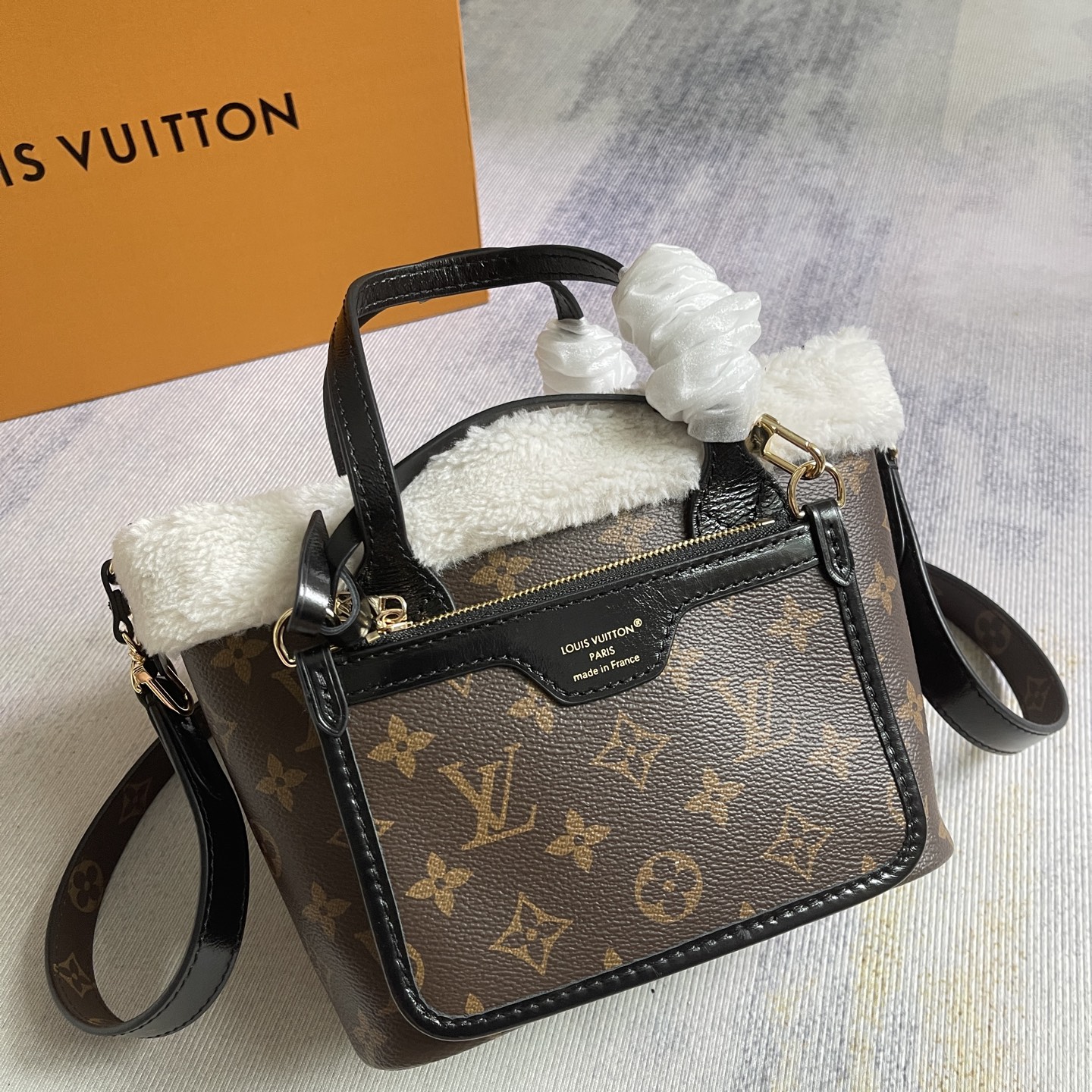 Neverfull Bandouliere Inside Out BB Handbag in Monogram Canvas and Shearling - Image 2