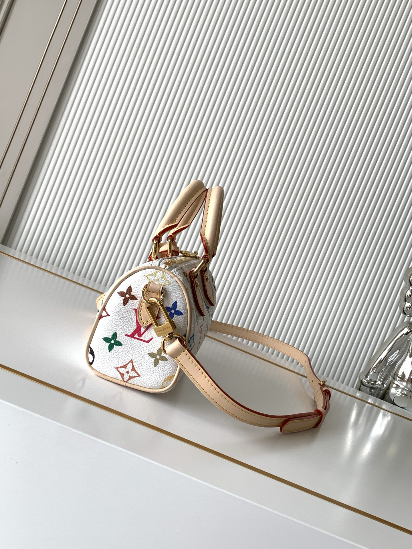 Nano Speedy Handbag in Monogram Coated Canvas - Image 2