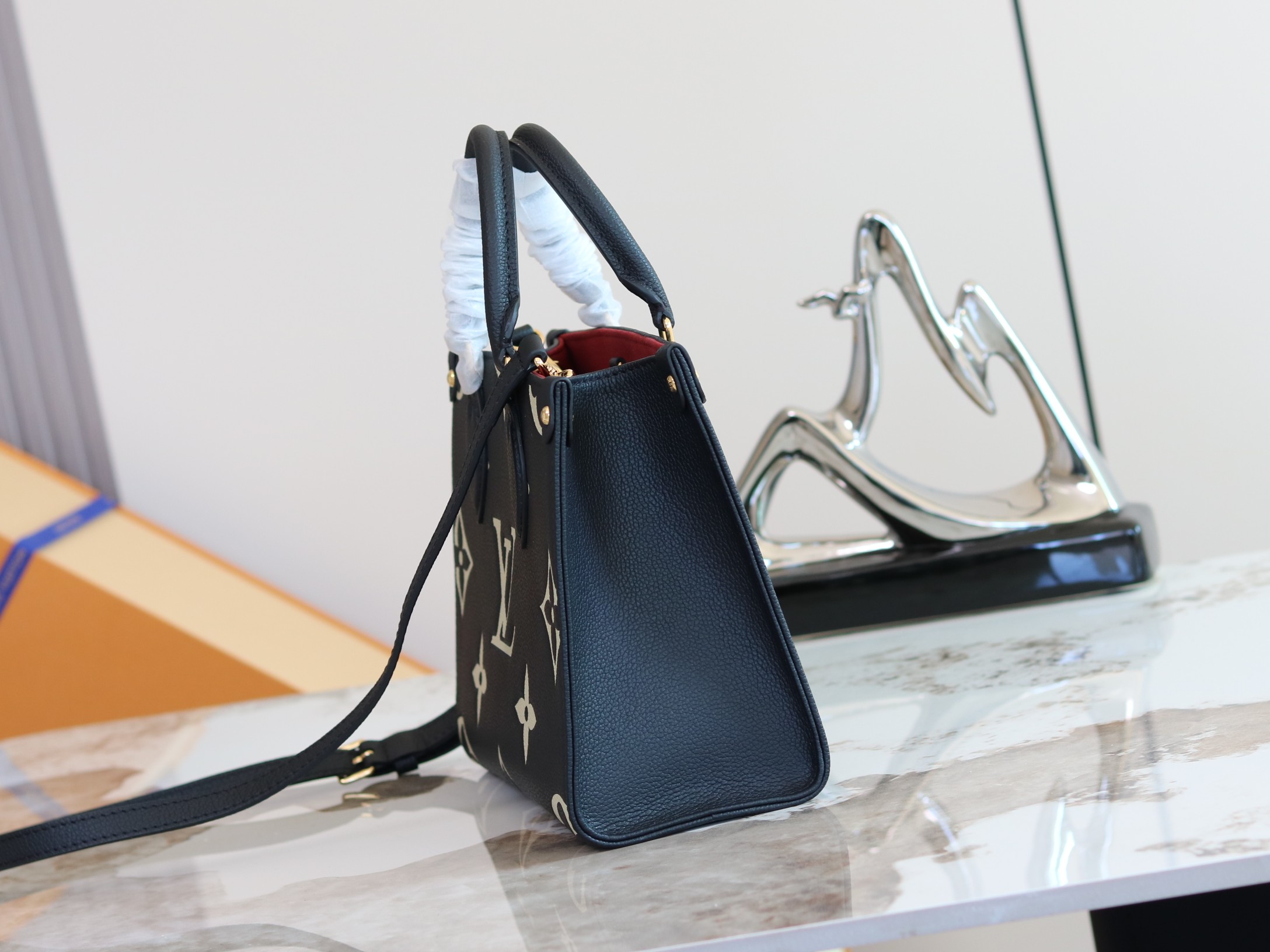 Louis Vuitton Onthego Small Tote Bag in Monogram Empreinte Leather - Image 2