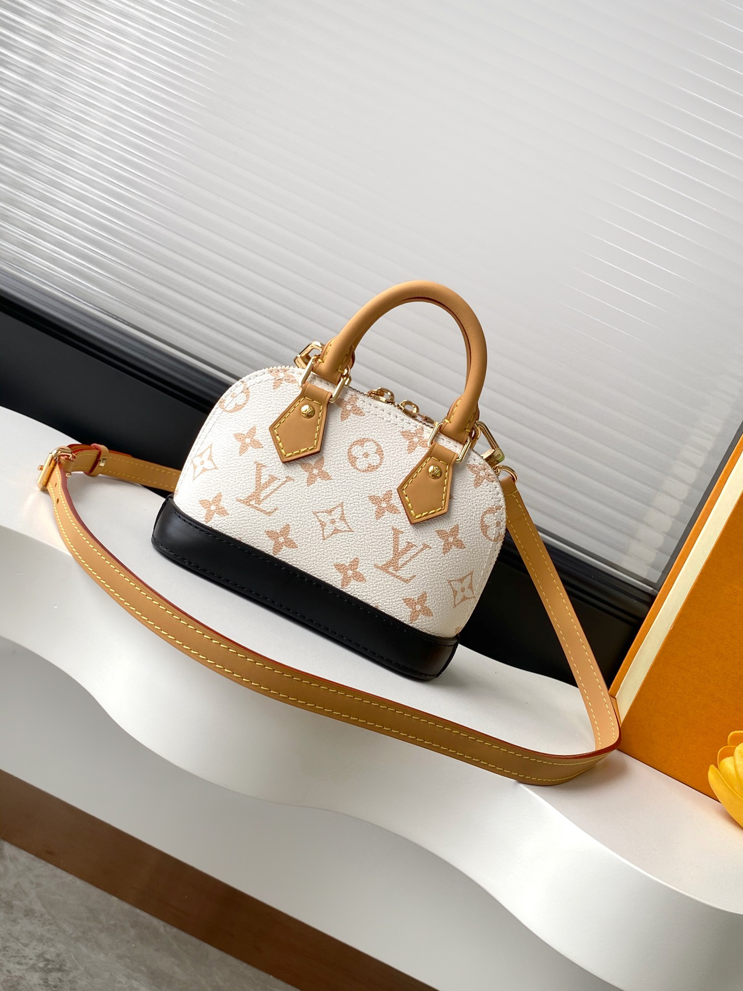 Louis Vuitton Nano Alma Handbag in Monogram Dune Canvas - Image 2