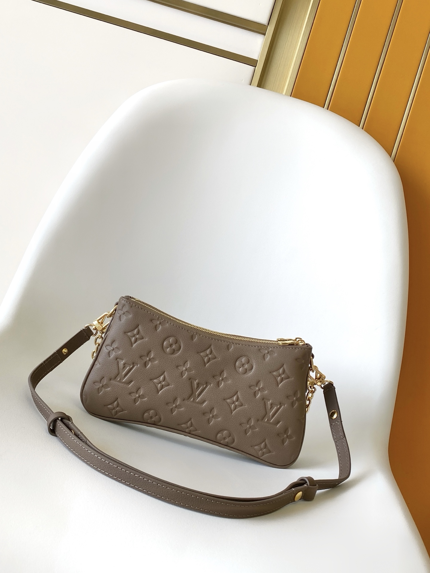 Louis Vuitton Liv Pochette in Monogram Empreinte Leather - Image 2