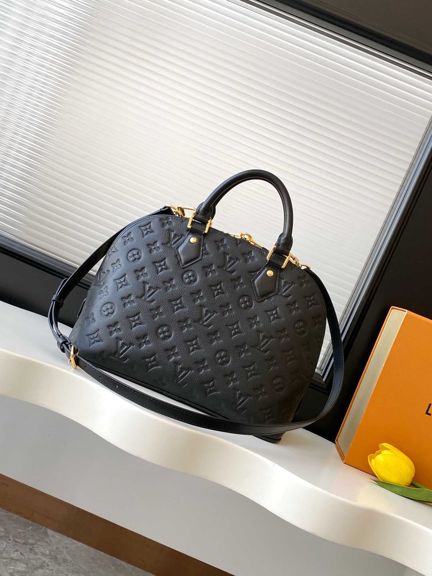 Louis Vuitton Alma PM Handbag in Black Monogram Empreinte Leather - Image 3