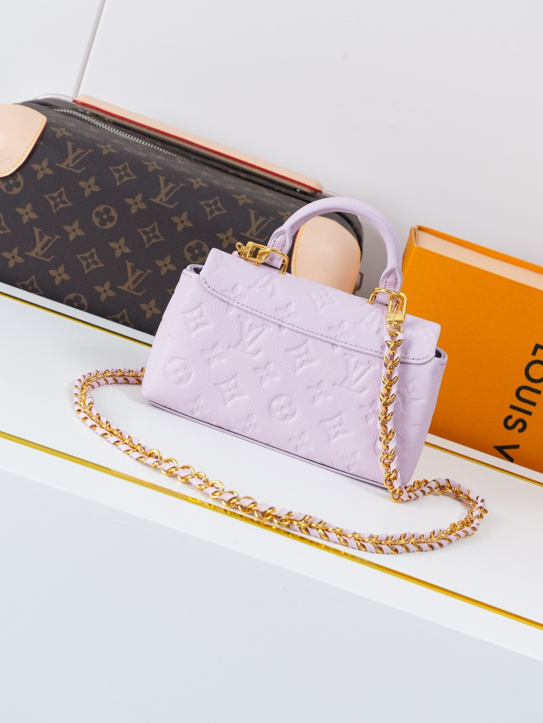 Louis Vuitton Nano Madeleine Handbag in Monogram Empreinte Leather - Image 3