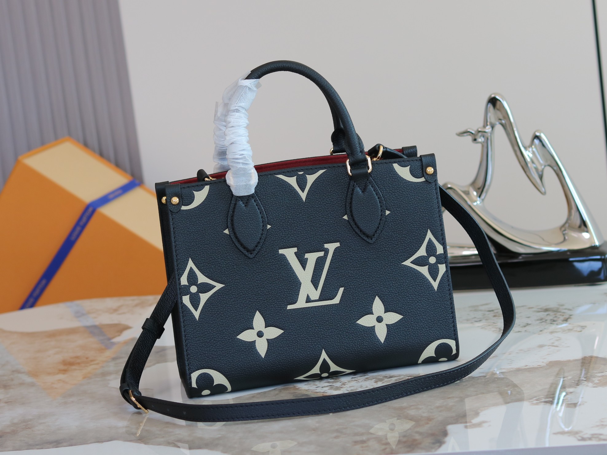 Louis Vuitton Onthego Small Tote Bag in Monogram Empreinte Leather - Image 3