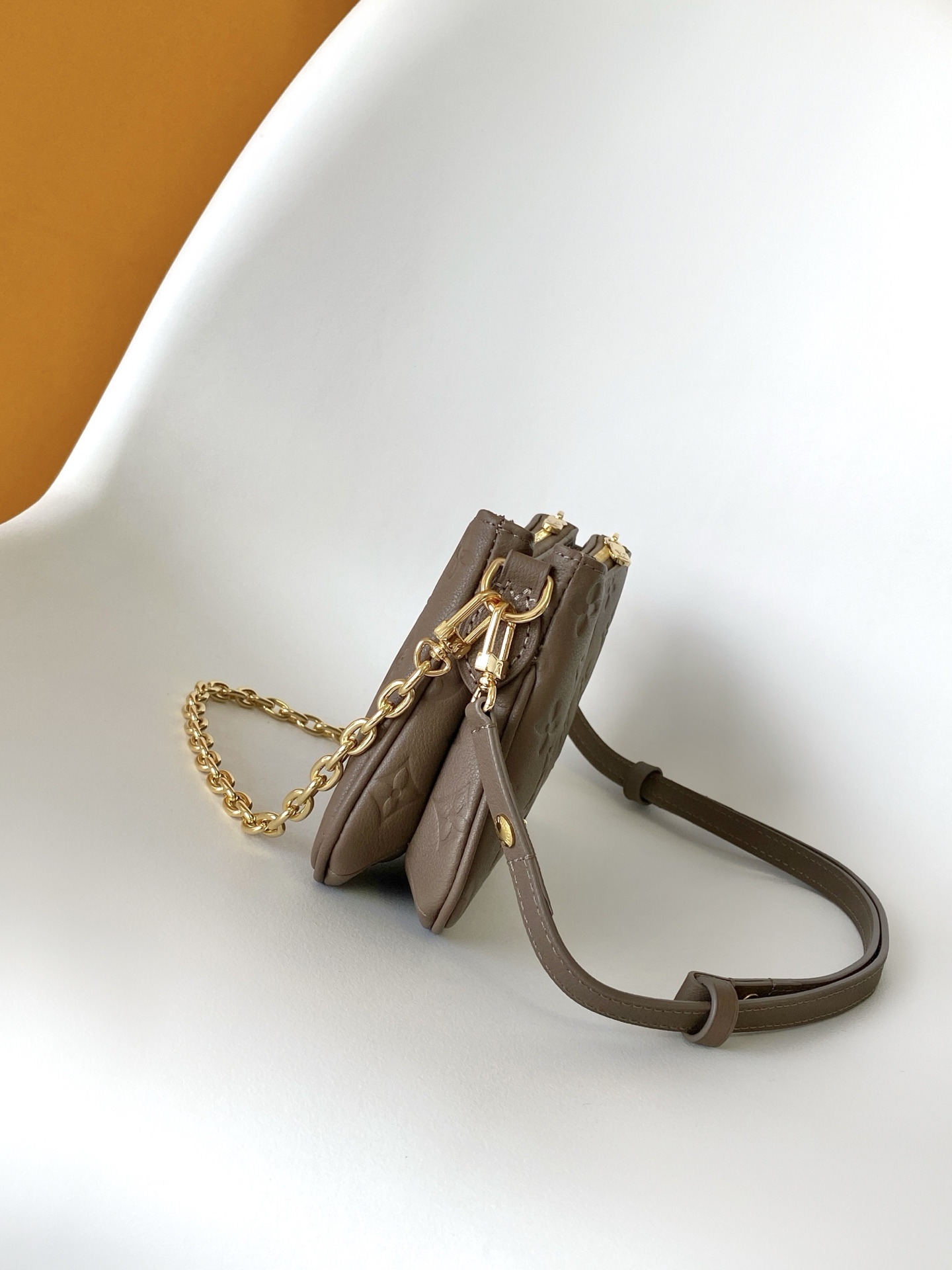 Louis Vuitton Liv Pochette in Monogram Empreinte Leather - Image 3