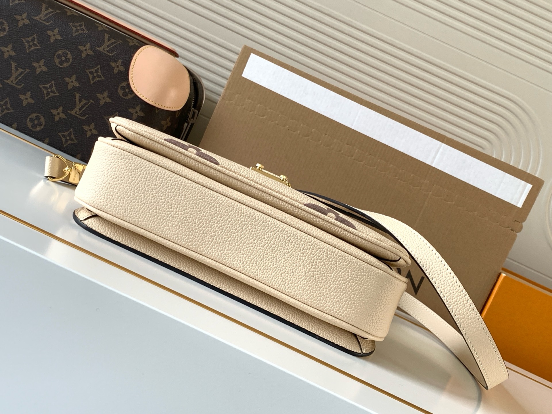 Louis Vuitton Pochette Metis Monogram Empreinte Shoulder Bag in Cream - Image 4