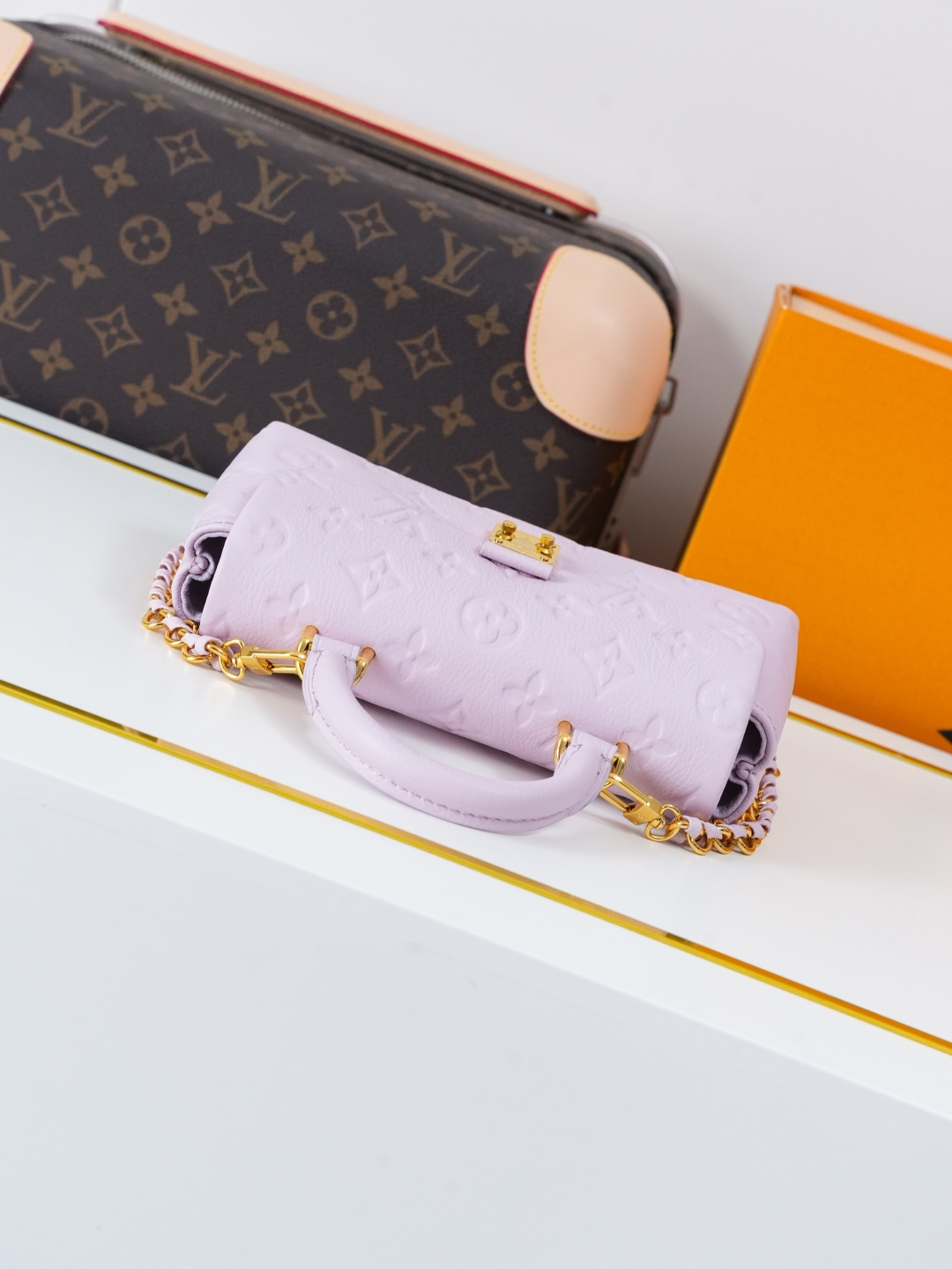 Louis Vuitton Nano Madeleine Handbag in Monogram Empreinte Leather - Image 4