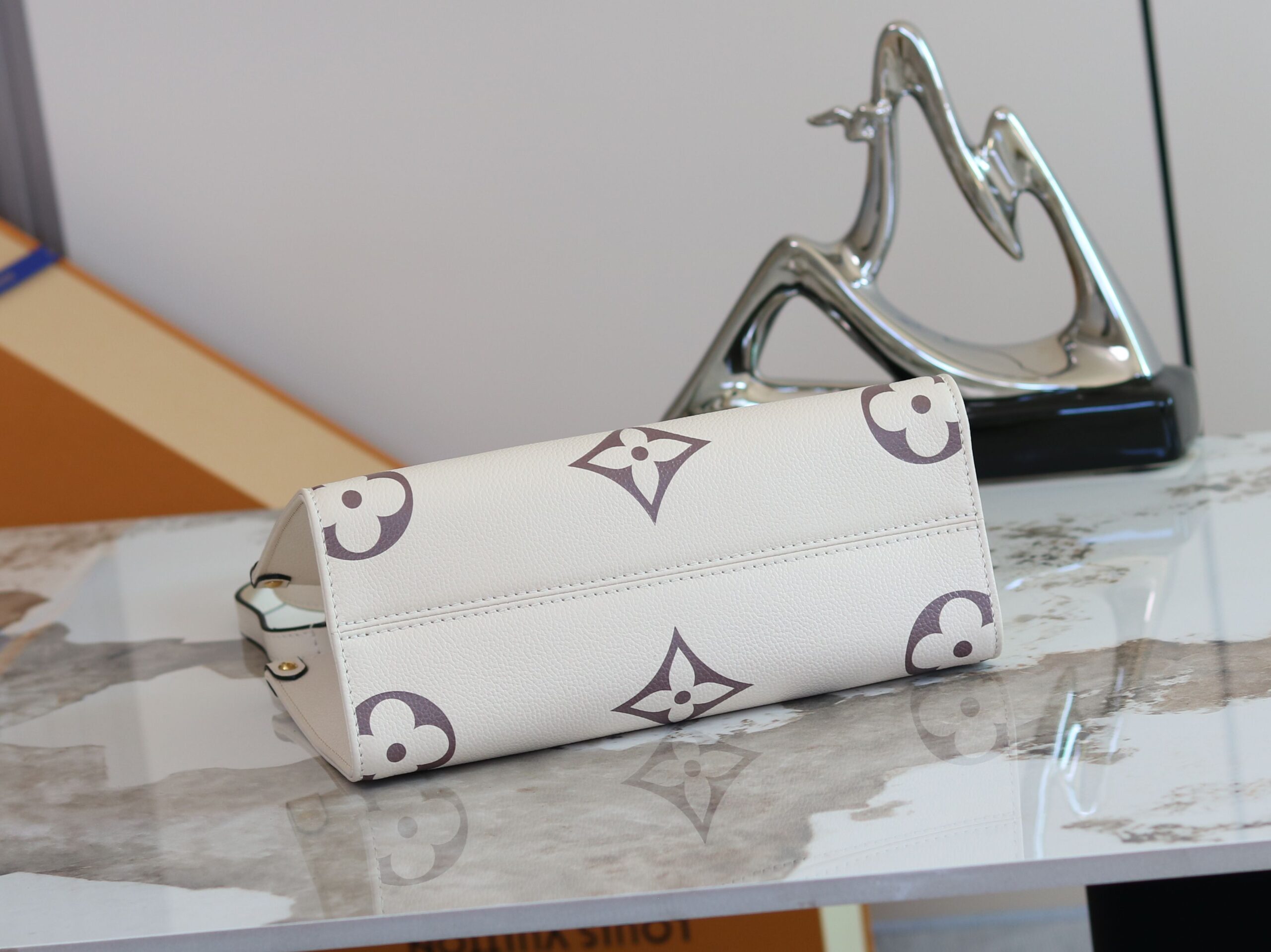 Louis Vuitton Onthego Mini Tote Bag in Monogram Empreinte Leather - Image 4