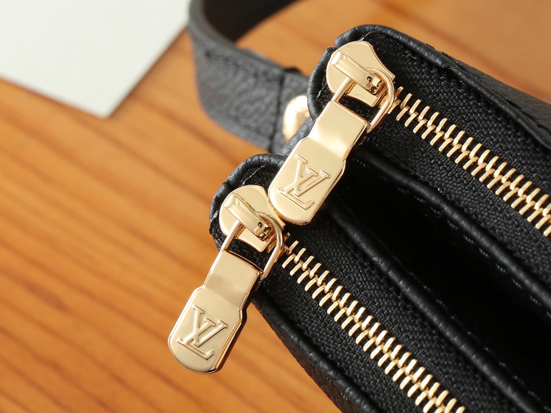Louis Vuitton Liv Pochette Monogram Empreinte Leather Bag - Image 5