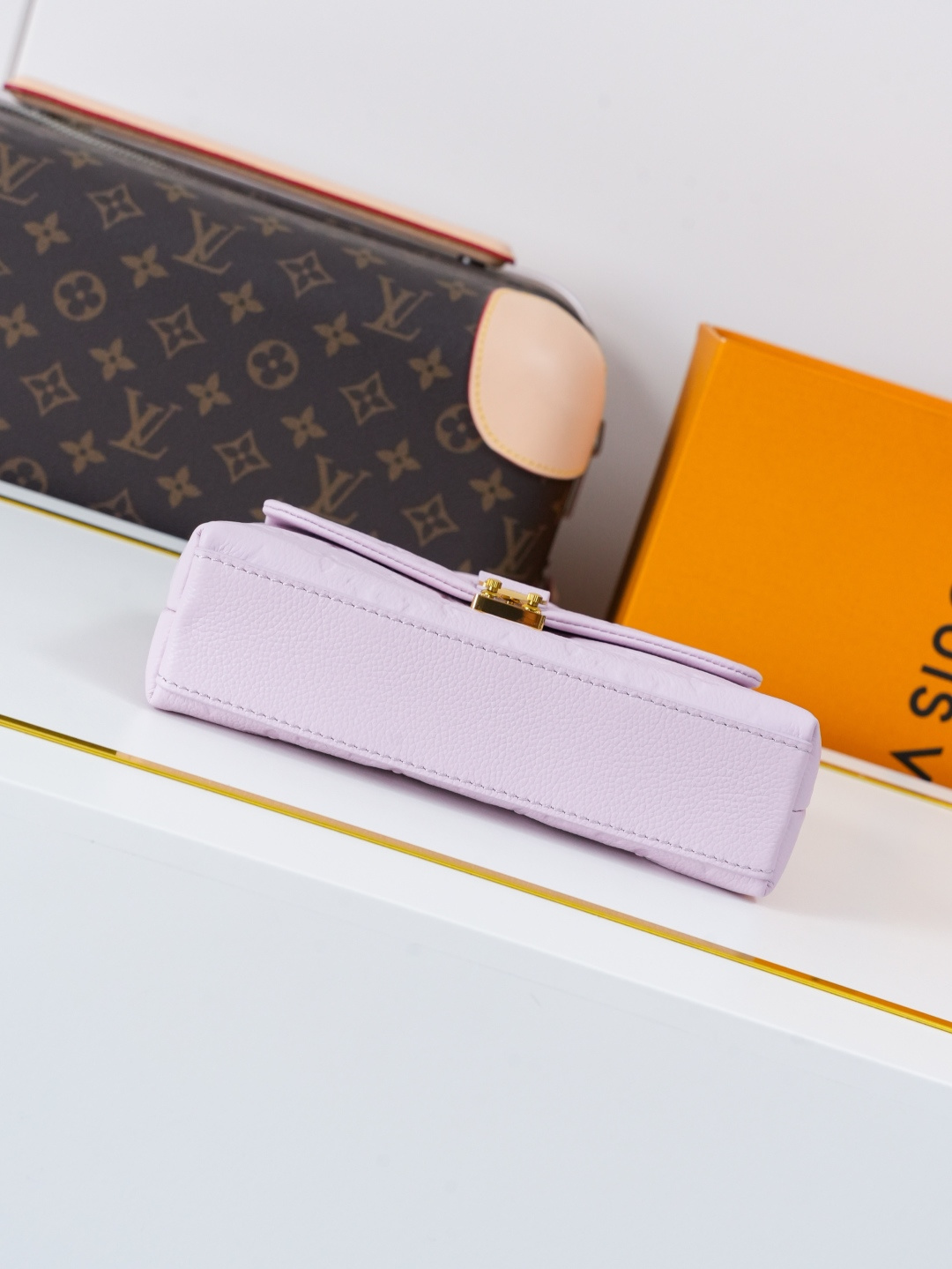Louis Vuitton Nano Madeleine Handbag in Monogram Empreinte Leather - Image 5