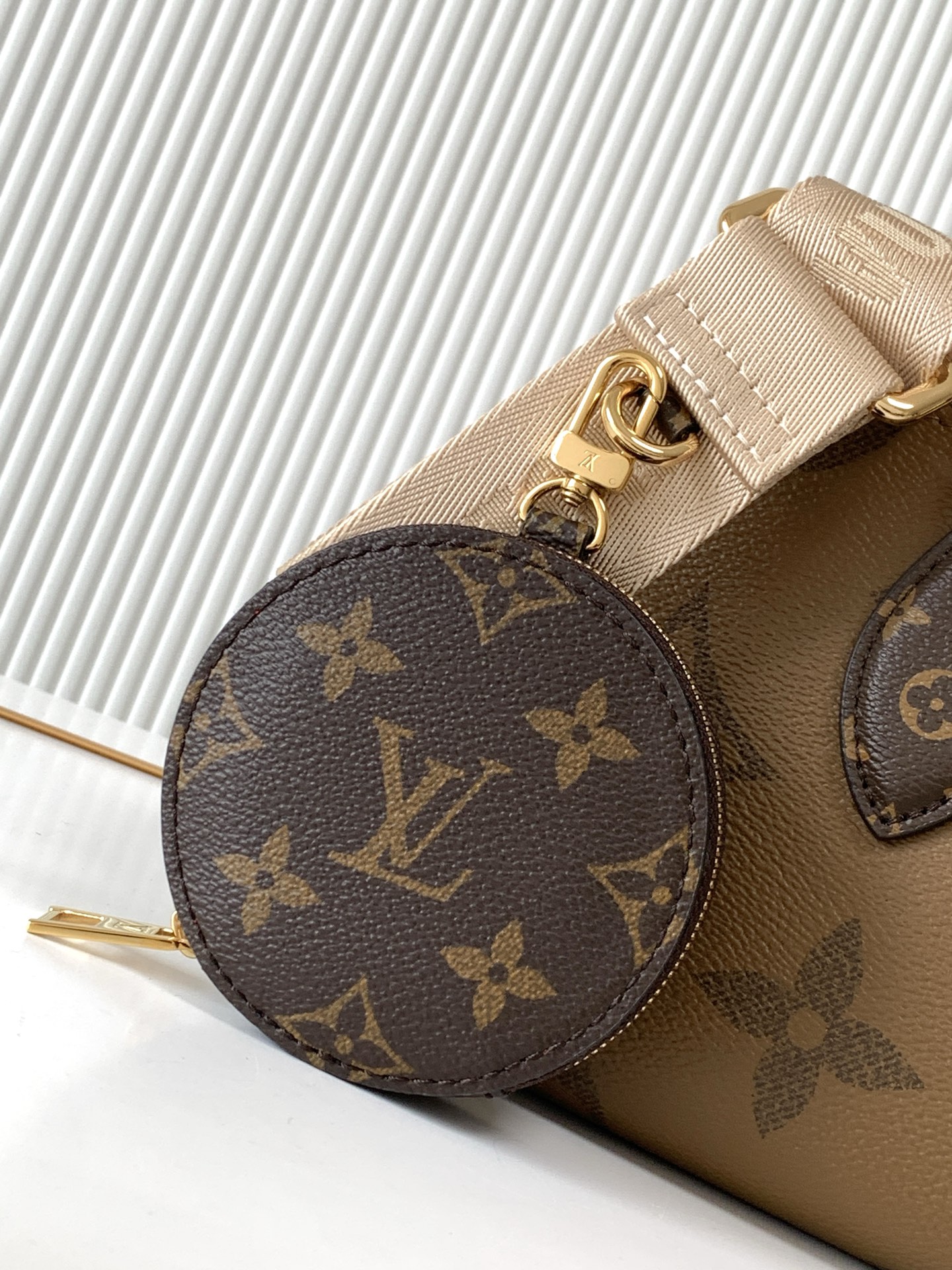 Louis Vuitton OnTheGo East West Mini Tote Bag in Giant Monogram and Monogram Reverse Canvas - Image 5