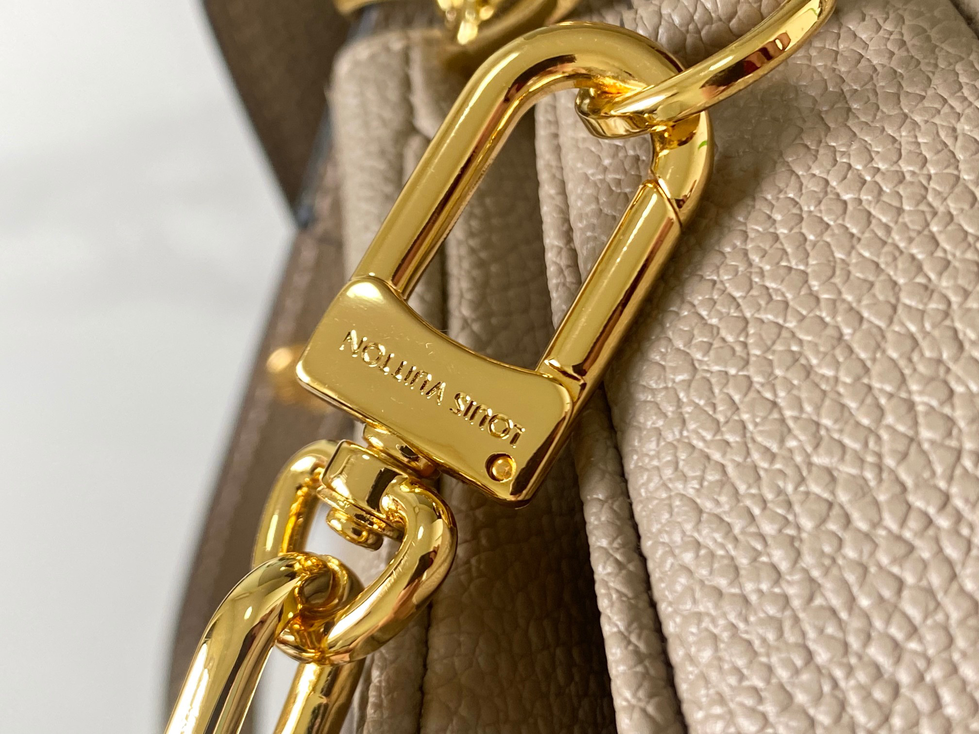 Louis Vuitton Pochette Metis East West Crossbody Bag in Monogram Empreinte Leather - Image 6