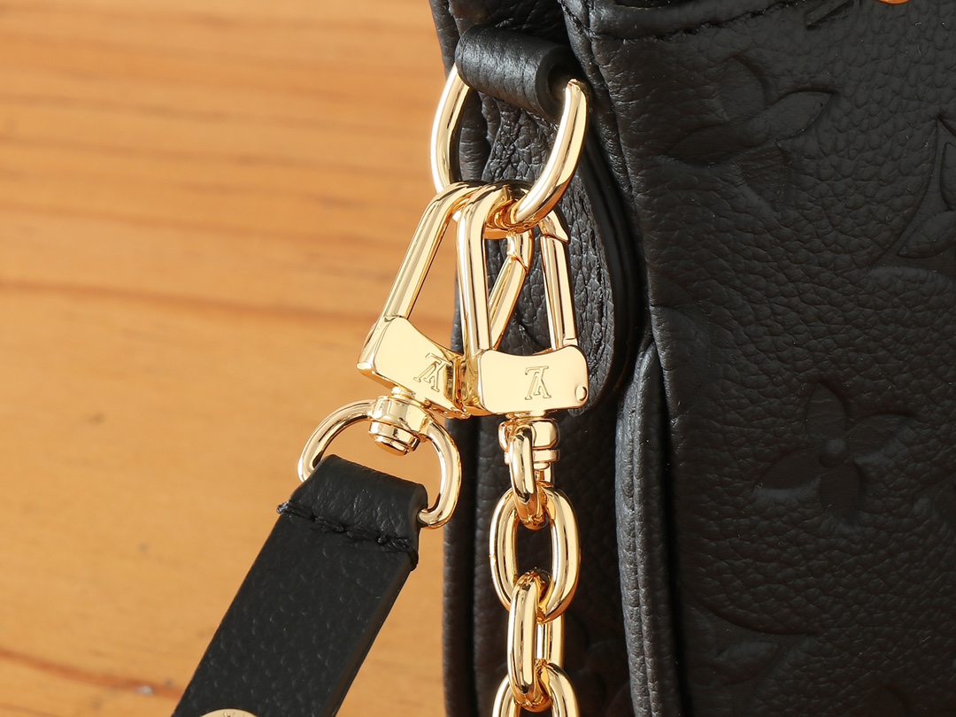 Louis Vuitton Liv Pochette Monogram Empreinte Leather Bag - Image 6
