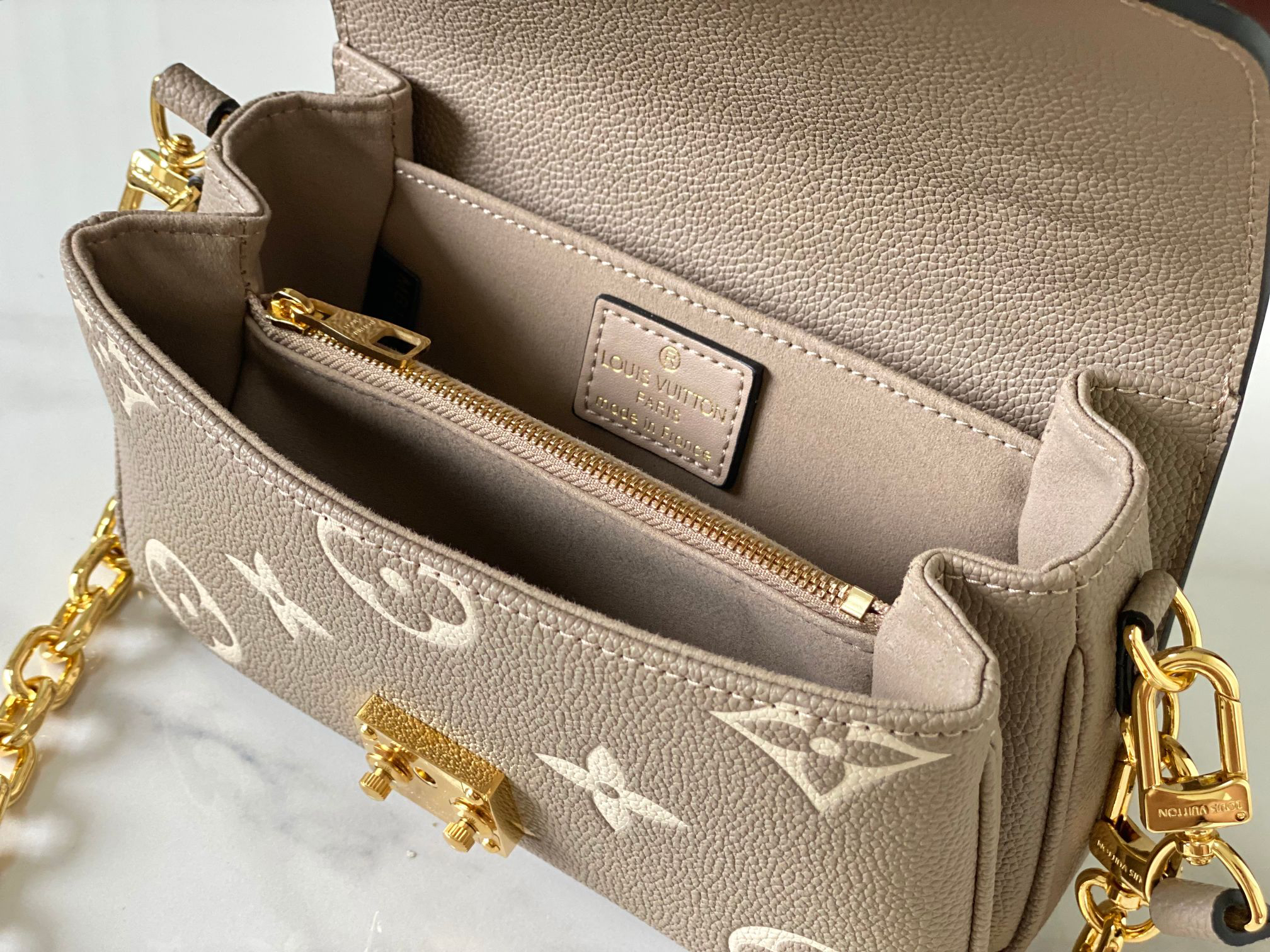 Louis Vuitton Pochette Metis East West Crossbody Bag in Monogram Empreinte Leather - Image 7