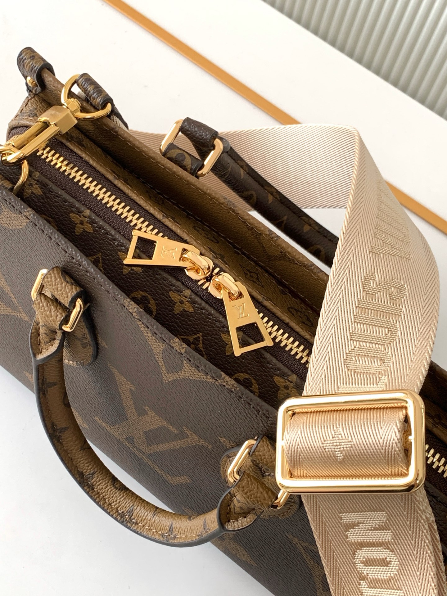 Louis Vuitton OnTheGo East West Mini Tote Bag in Giant Monogram and Monogram Reverse Canvas - Image 7