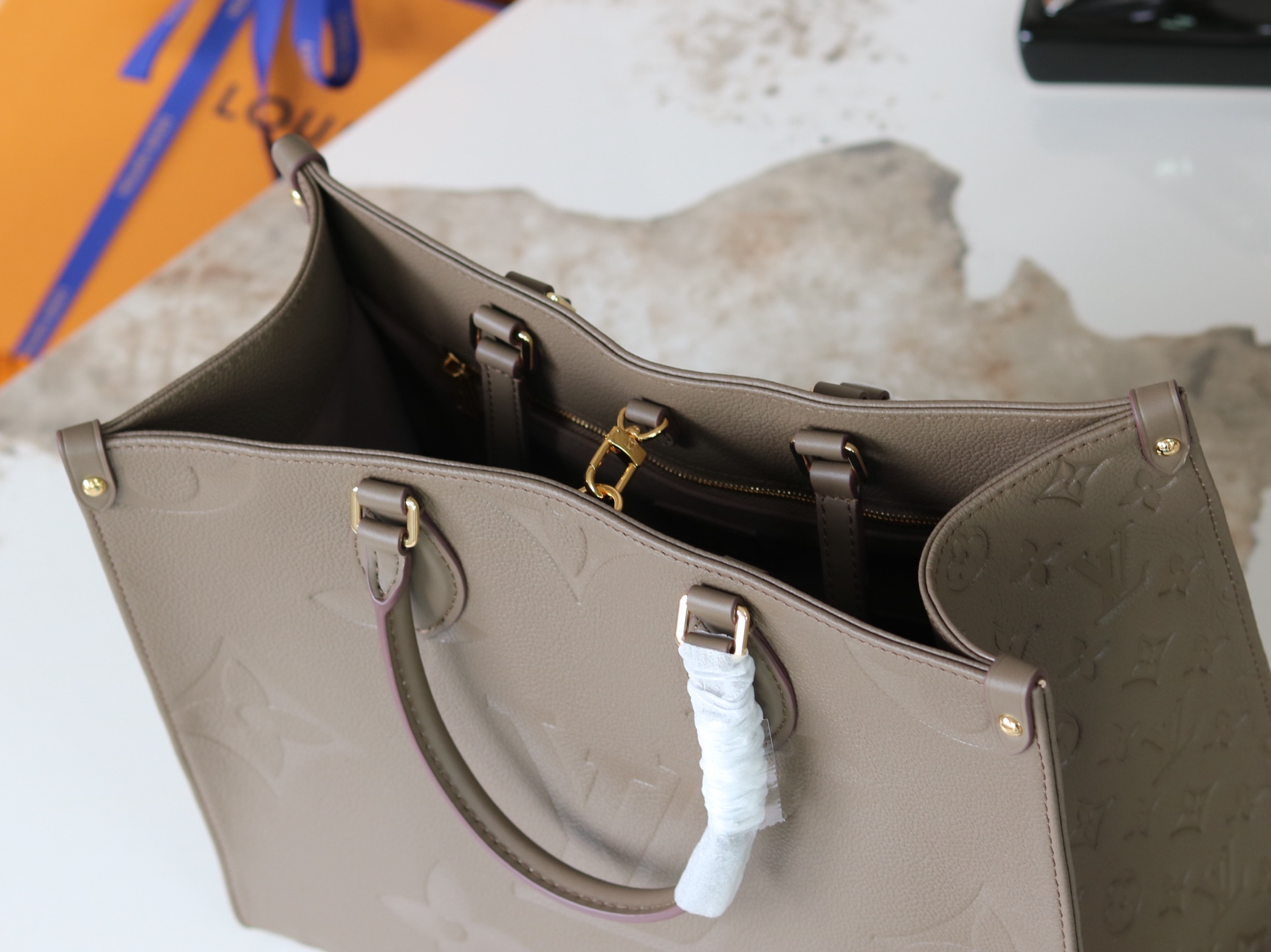 Louis Vuitton OnTheGo Medium Tote Bag in Monogram Empreinte Leather - Image 7