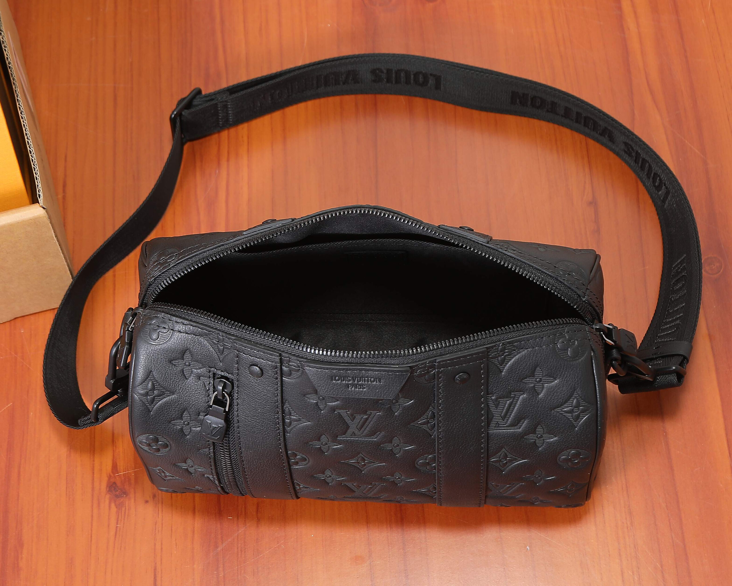 City Keepall Travel Bag in Monogram Shadow Leather - Image 8