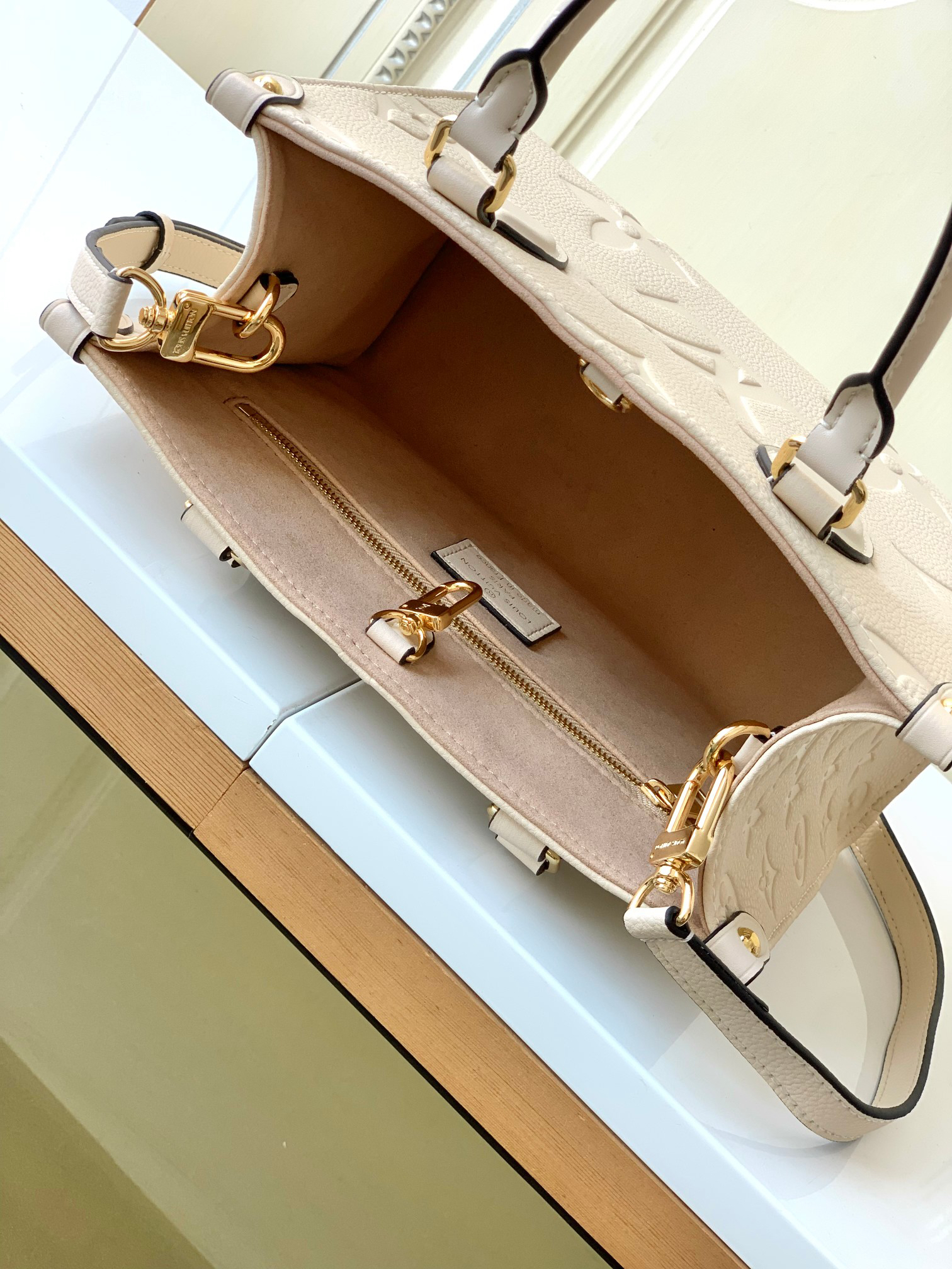 Louis Vuitton OnTheGo Mini Tote Bag in Monogram Empreinte Leather - Image 8