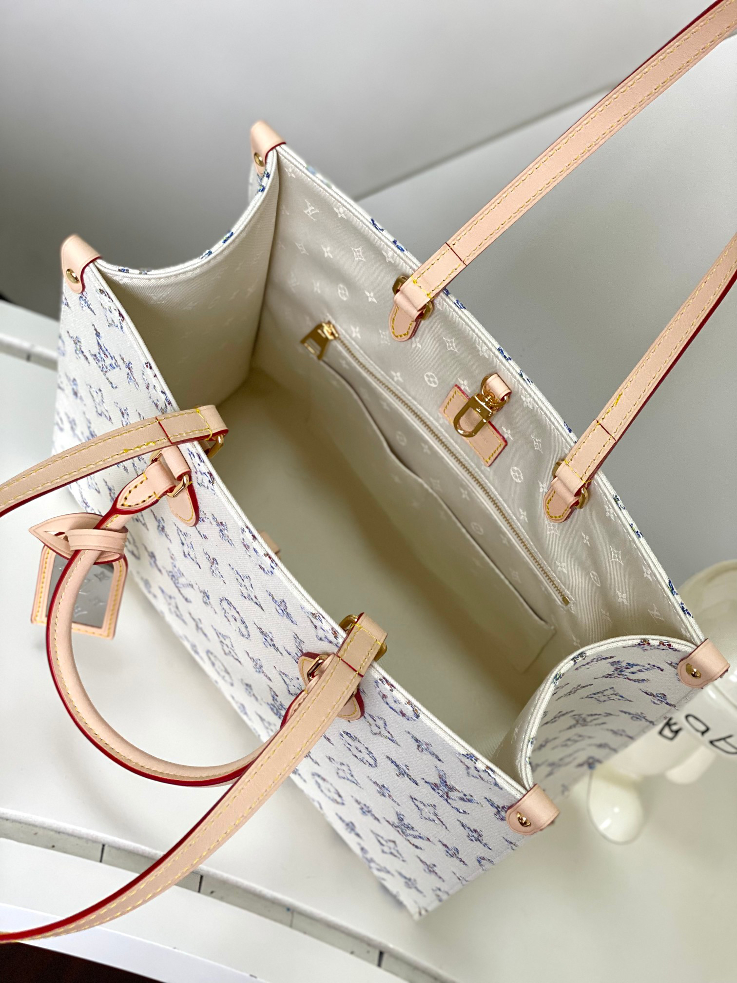 Louis Vuitton OnTheGo MM Tote Bag in White Denim - Image 8