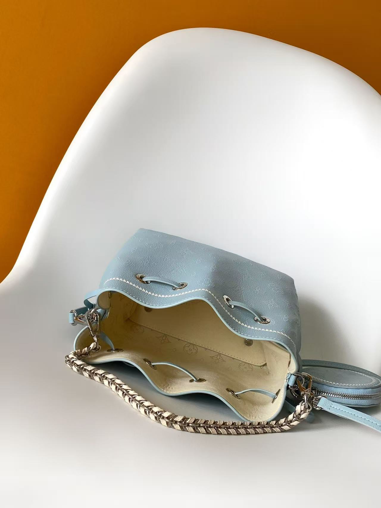 Monogram Perforated Leather Bucket Bag - Image 8
