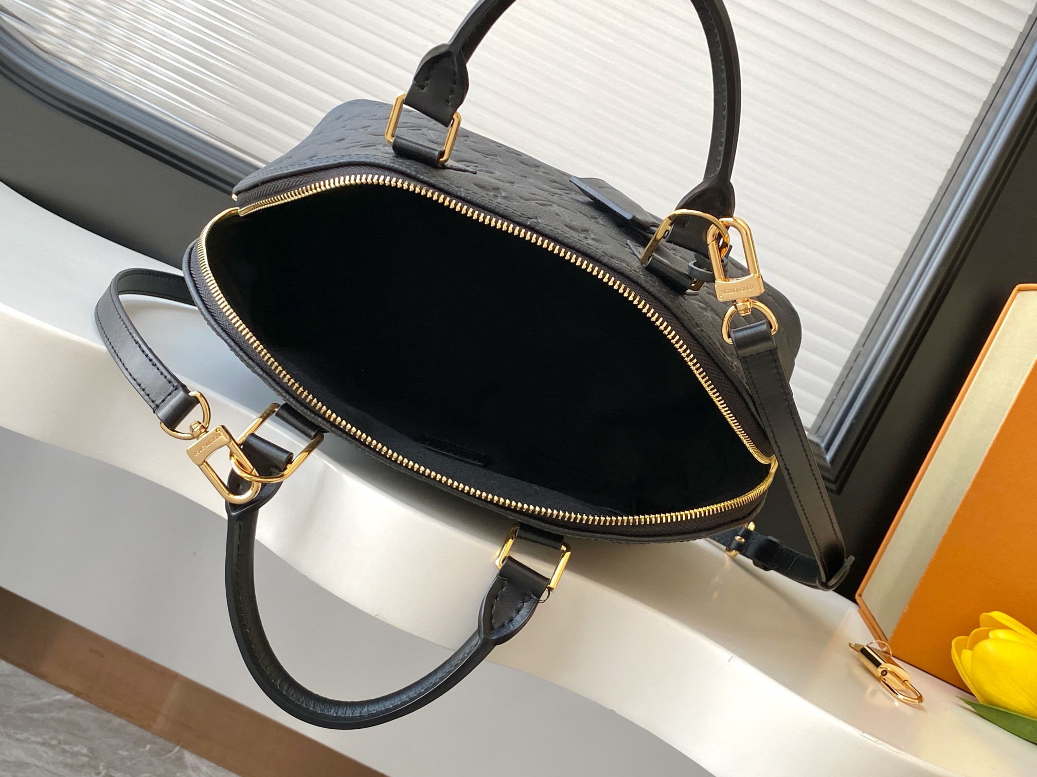 Louis Vuitton Alma PM Handbag in Black Monogram Empreinte Leather - Image 8