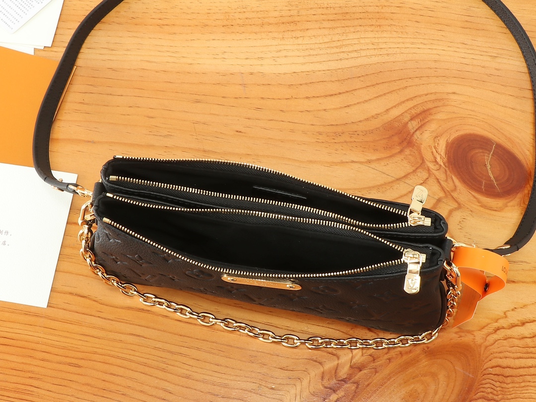 Louis Vuitton Liv Pochette Monogram Empreinte Leather Bag - Image 8