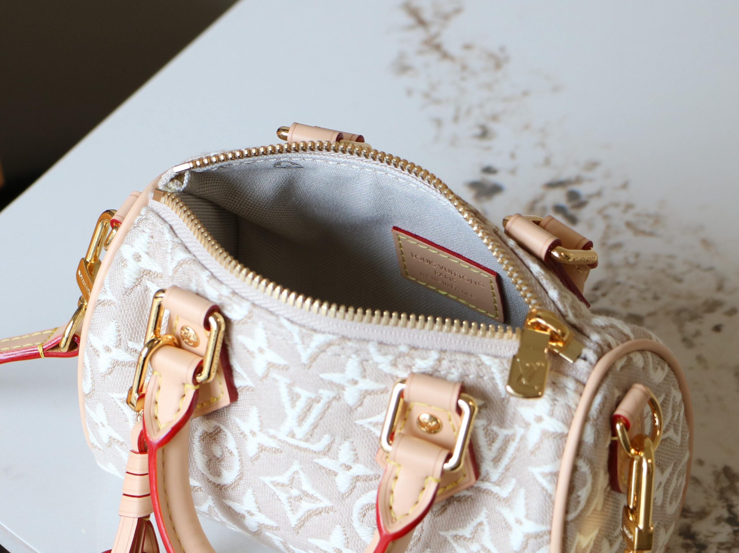 Louis Vuitton Nano Speedy Handbag in White Embossed Canvas - Image 8