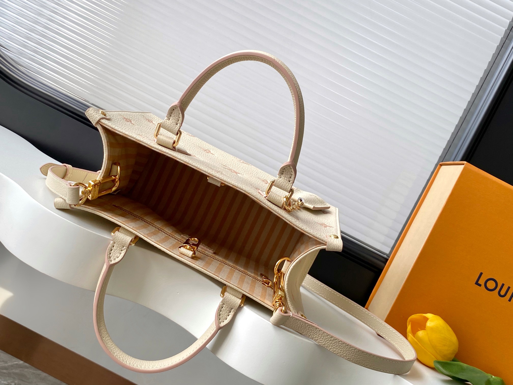 Louis Vuitton OnTheGo Small Handbag in Beige Monogram Empreinte Leather - Image 8