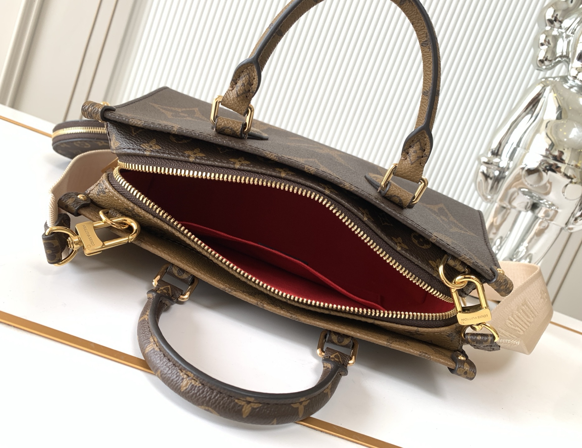 Louis Vuitton OnTheGo East West Mini Tote Bag in Giant Monogram and Monogram Reverse Canvas - Image 8