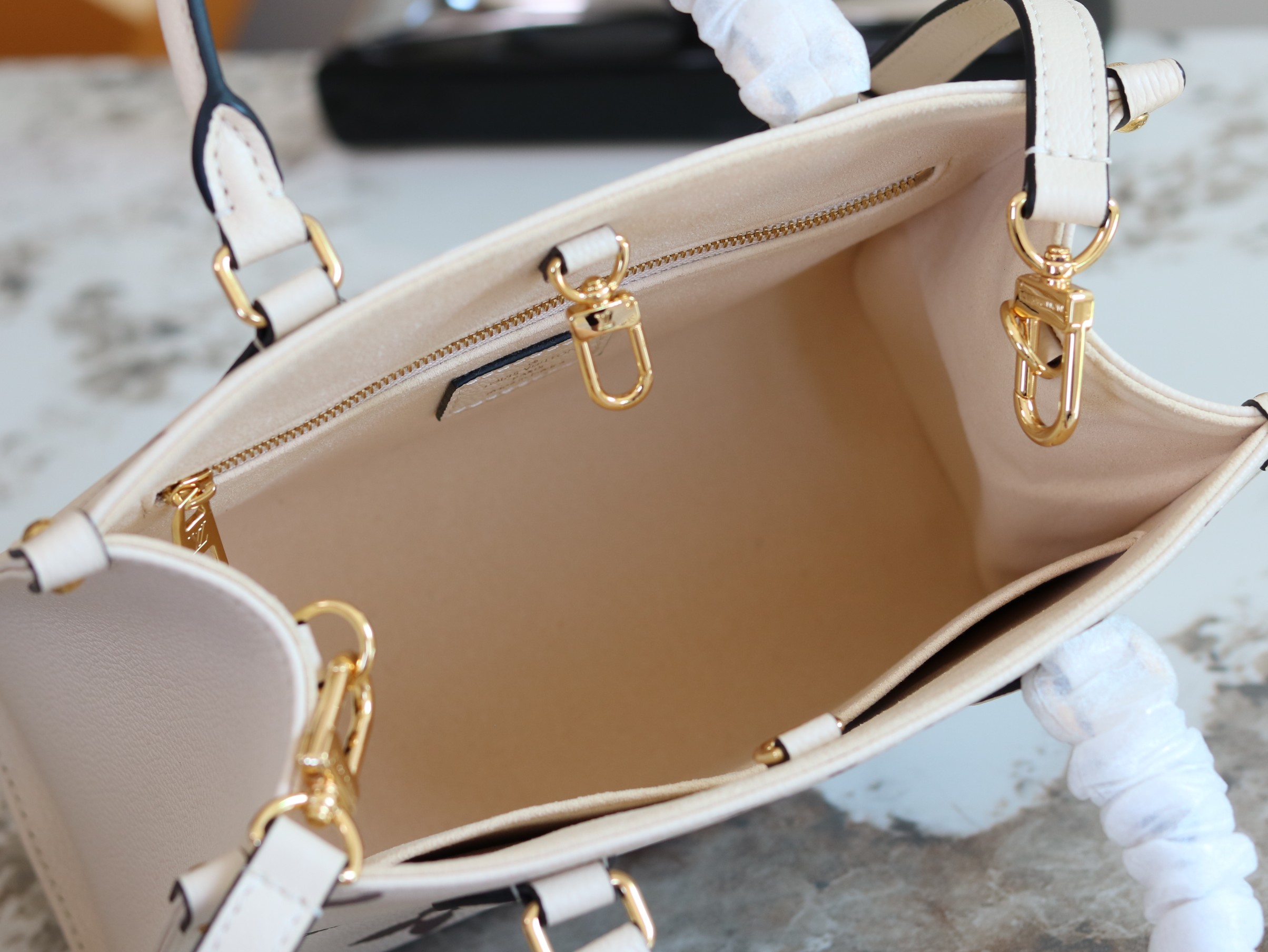 Louis Vuitton Onthego Mini Tote Bag in Monogram Empreinte Leather - Image 8