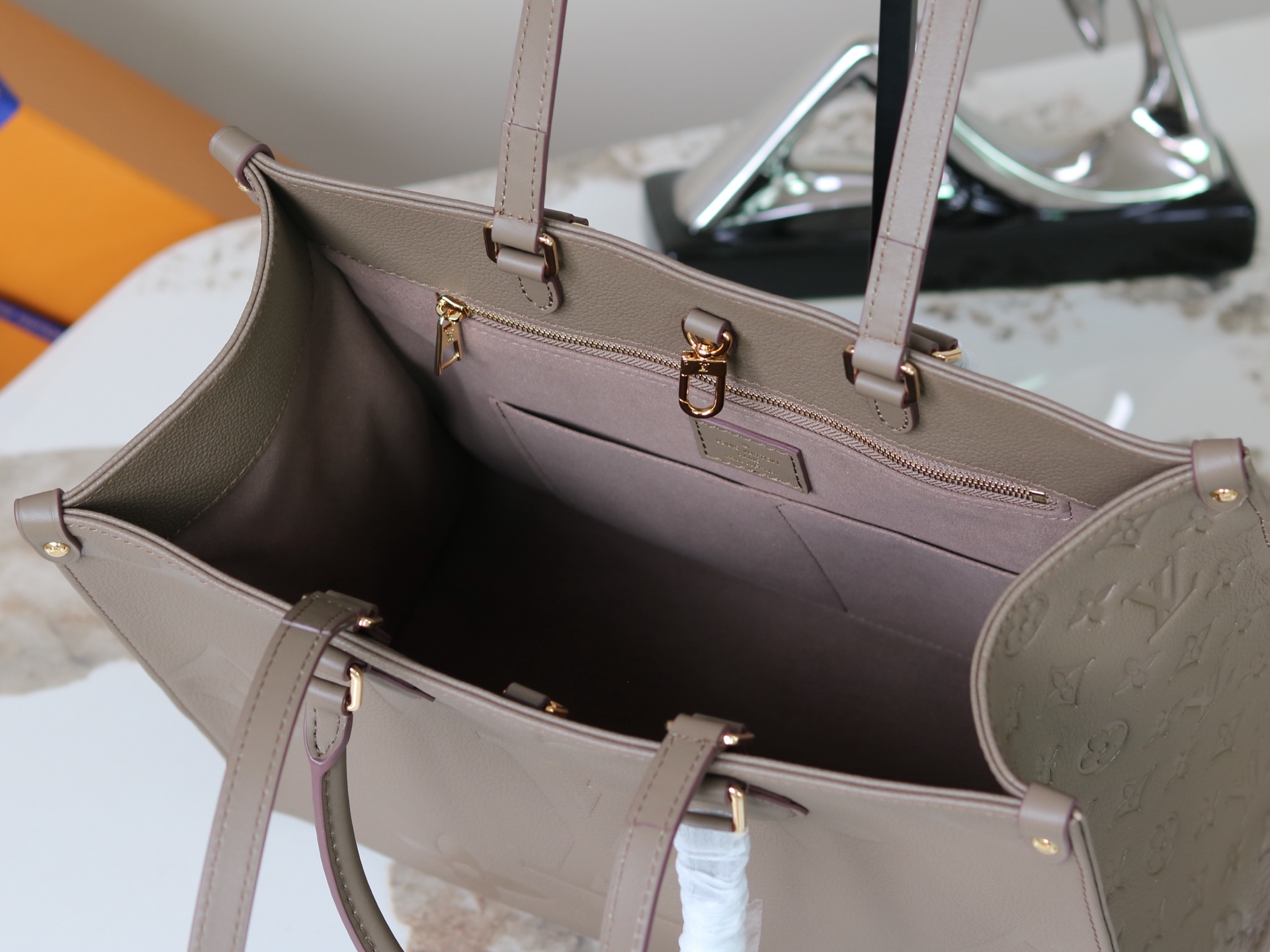 Louis Vuitton OnTheGo Medium Tote Bag in Monogram Empreinte Leather - Image 8