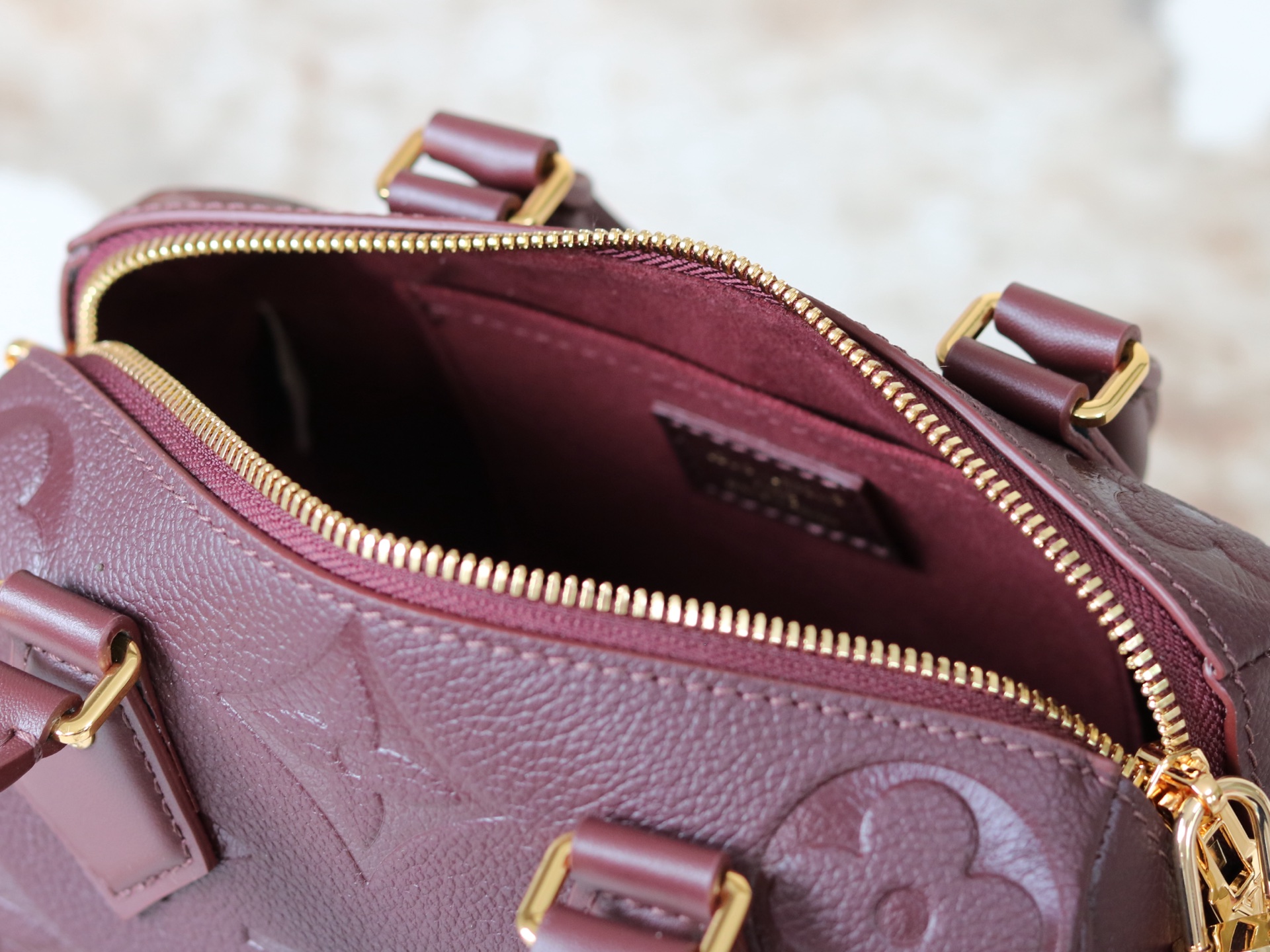 Louis Vuitton Sedy Bandoulière 20 Crossbody Bag in Burgundy Monogram Empreinte Leather - Image 8
