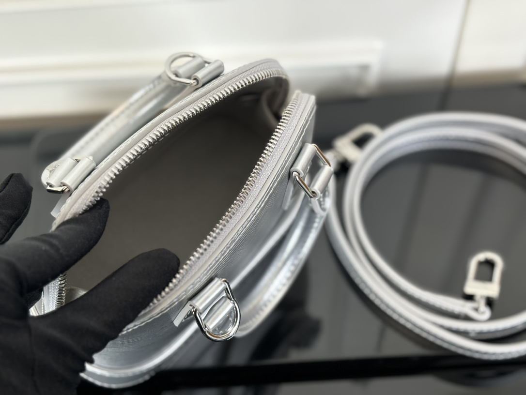 Louis Vuitton Nano Alma Crossbody Bag in Silver Epi Leather - Image 8