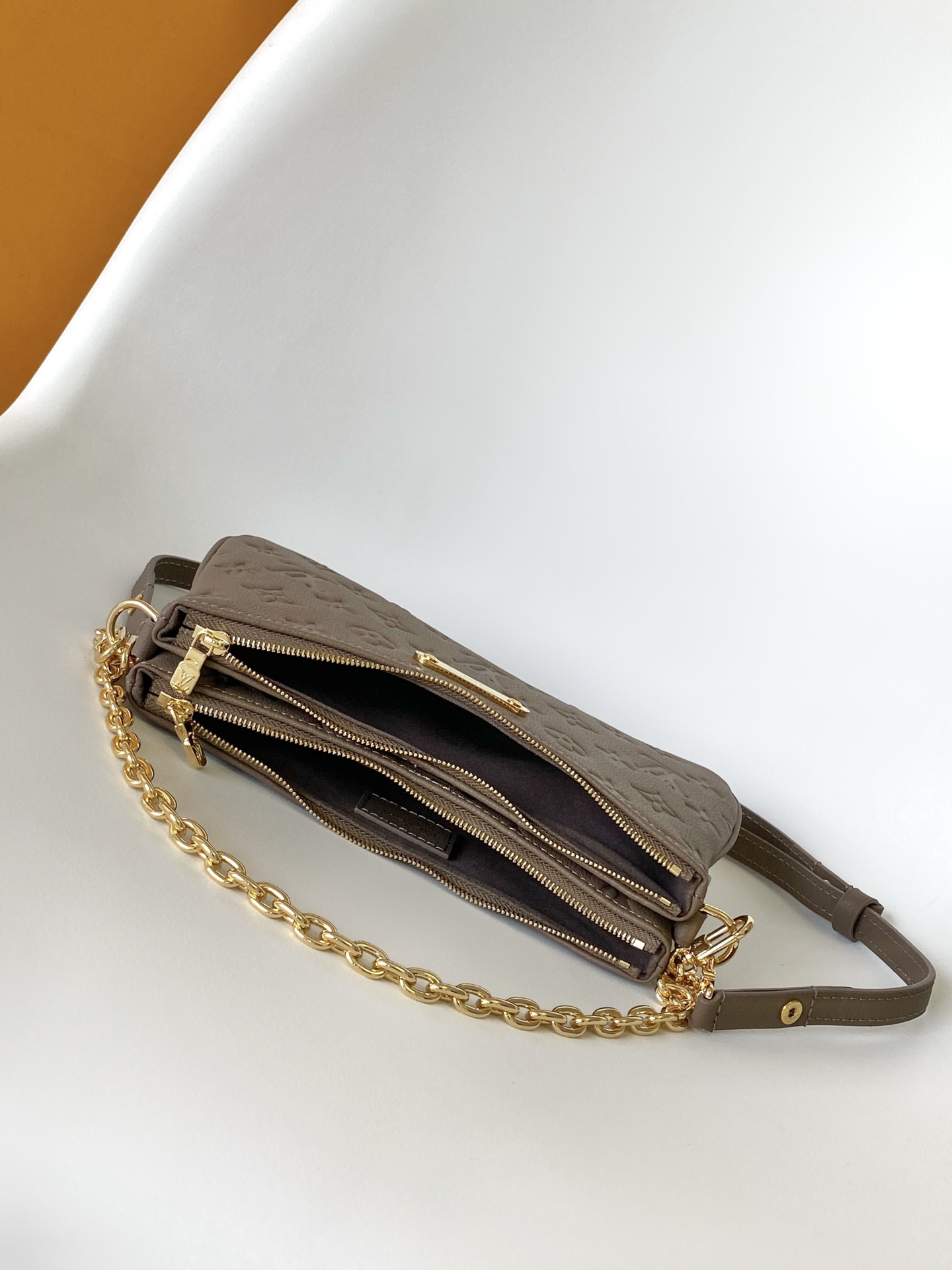 Louis Vuitton Liv Pochette in Monogram Empreinte Leather - Image 8
