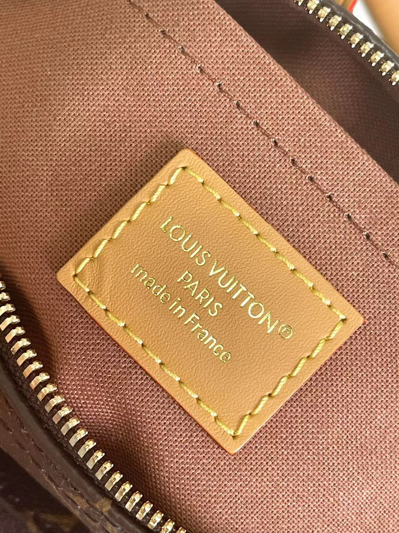 Keepall Bandoulière 25 Leather and Canvas Crossbody Bag - Image 9